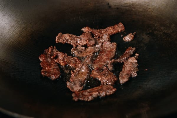 Fried crispy beef in wok, thewoksoflife.com