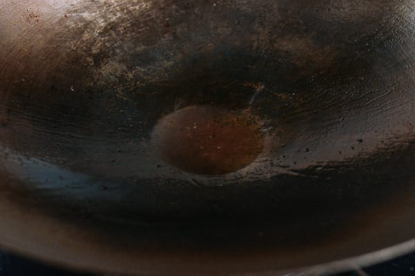 Oil left in the woks, thewoksoflife.com